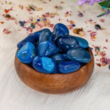 Load image into Gallery viewer, "Wooden bowl filled to the brim with tumbled blue agate crystals," - Down to Earth.