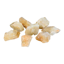 Load image into Gallery viewer, "Side angle of eight raw citrine crystals against a white background," - Down to Earth.