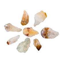 Load image into Gallery viewer, "Top-down view of eight raw citrine crystal points against a white background," - Down to Earth.