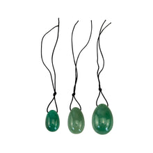 Load image into Gallery viewer, "Three green aventurine yoni eggs ranging from small to large. These are used to strengthen the pelvic floor in Kegel exercises," - Down to Earth.