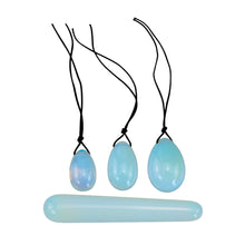 Load image into Gallery viewer, "Set of three opalite yoni eggs with a crystal wand. These items are used to strengthen the pelvic floor with Kegel exercises," - Down to Earth.