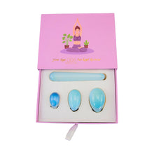 Load image into Gallery viewer, "Top-down view of an opalite yoni egg set within an open light pink box," - Down to Earth.