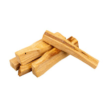 Load image into Gallery viewer, "Five sticks of Palo Santo sticks, also known as sacred wood, on a white background," - Down to Earth.