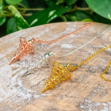 Load image into Gallery viewer, "Three spiral pendulums in the color variations rose gold, silver, and gold," - Down to Earth.