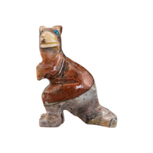 Load image into Gallery viewer, "Straight-on view of a kangaroo stone sculpture with blue eyes," - Down to Earth.