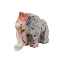 Load image into Gallery viewer, "Carved stone mammoth figurine against a white background," - Down to Earth.