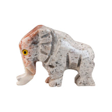 Load image into Gallery viewer, "Left side of a carved stone mammoth with yellow eyes," - Down to Earth.