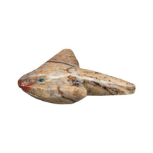 Load image into Gallery viewer, "Left side of a carved stone figurine in the shape of a stingray with blue eyes against a white background," - Down to Earth.