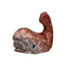 Load image into Gallery viewer, "Left side of a stone-carved miniature in the shape of a whale with blue eyes against a white backdrop," - Down to Earth.