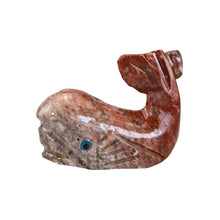 Load image into Gallery viewer, "Left side of a stone-carved whale with blue eyes against a white backdrop," - Down to Earth.