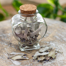 Load image into Gallery viewer, A heart-shaped bottle with dried lavender and white sage in a bottle. - Down to Earth.