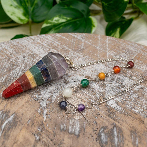 7 Chakra Faceted Pendulum with 7 Chakra Stones Styled Photo - Down To Earth