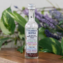 Load image into Gallery viewer, 9 Luck Mineral Talisman Bottle on a wooden surface - Down to Earth
