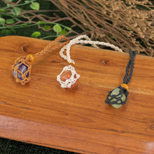 Load image into Gallery viewer, Adjustable Macrame Crystal Holder Necklace group photo with crystals displayed on a styled background - Down to Earth
