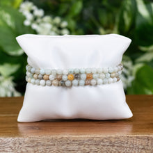 Load image into Gallery viewer, Amazonite 4mm Bracelet on a pillow displayed on a styled background - Down To Earth
