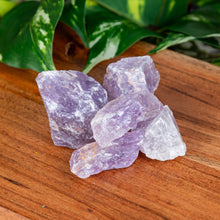 Load image into Gallery viewer, Amethyst Raw on a wooden surface high angle - Down to Earth
