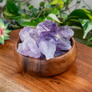 Amethyst Points in a wooden bowl styled photo - Down to Earth