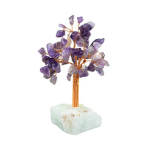 Load image into Gallery viewer, Amethyst crystal tree on a green base with a white background
