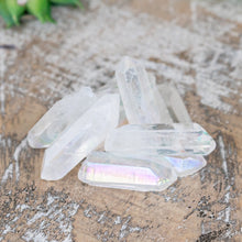 Load image into Gallery viewer, Angel Aura Quartz Crystal Point on a wooden surface high angle styled photo - Down To Earth
