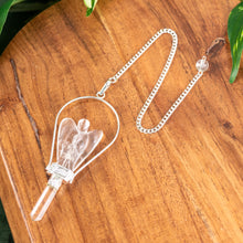 Load image into Gallery viewer, Angel Point Pendulum Clear Quartz on a wooden surface - Down to Earth
