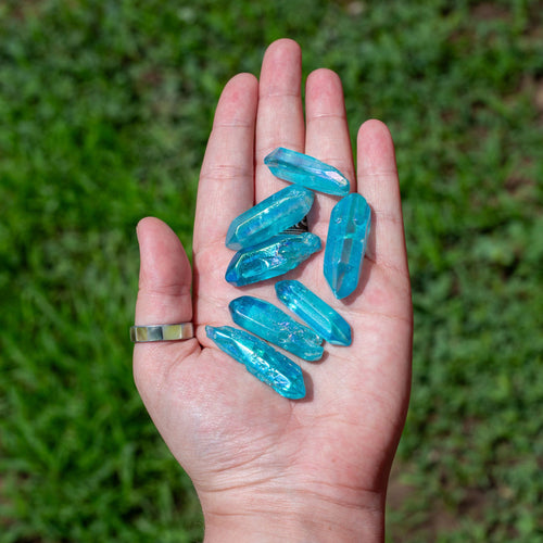 Aqua Aura Quartz Points in the Palm of a Hand - Down To Earth