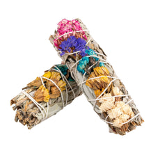 Load image into Gallery viewer, "White sage smudge wand with assorted flowers on a white background," - Down to Earth.
