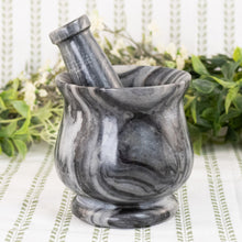 Load image into Gallery viewer, Black &amp; White Stone 4" Mortar &amp; Pestle front facing on a style background - Down To Earth
