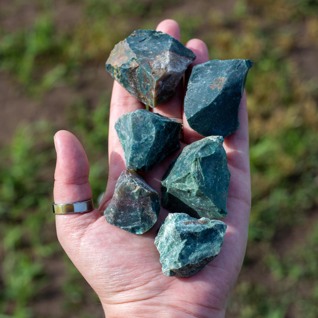 Bloodstone Raw in the palm of a Hand - Down To Earth