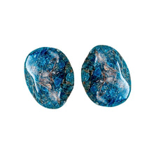 Load image into Gallery viewer, Pictured here is two Blue Apatite palm stones. Each is approximately 1 to 2 inches long. Blue Apatite is a deep blue color with some streaks of brown. - Down to Earth.
