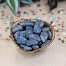 Load image into Gallery viewer, Tumbled Blue Quartz Crystals in a styled photo - Down To Earth
