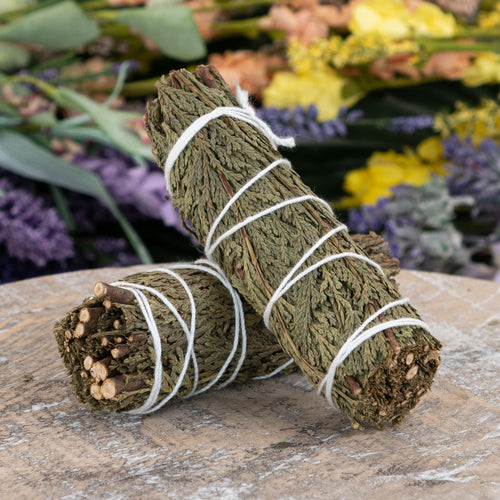 Bundle of Cedar Smudge Sticks in a styled photo - Down to Earth 