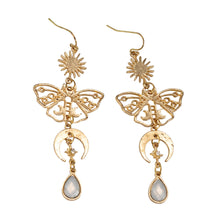 Load image into Gallery viewer, Celestial Sun &amp; Moon Butterfly Earrings top down displayed on a white background - Down To Earth
