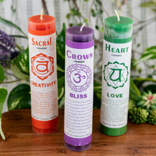 Load image into Gallery viewer, Chakra Energy Pillar Candle on a wooden surface styled photo top-down angle - Down to Earth
