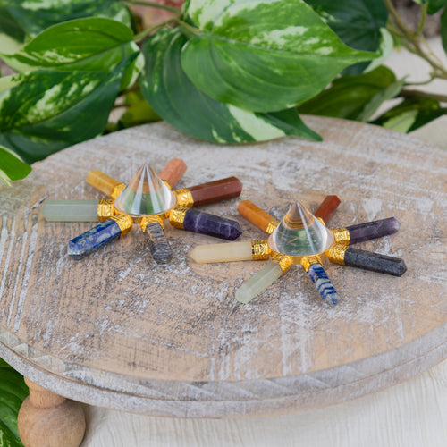 Chakra Gem & Crystal Generator on a wooden surface - Down to Earth
