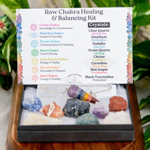 Load image into Gallery viewer, Chakra Balancing &amp; Healing Kit Raw on a wooden surface styled photo frotn angle - Down to Earth
