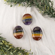 Load image into Gallery viewer, Chakra Palm Stone Group Photo with leaves on a style background - Down To Earth 
