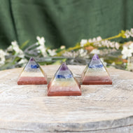 35mm Chakra Pyramid group photo with flowers on a style background - Down To Earth