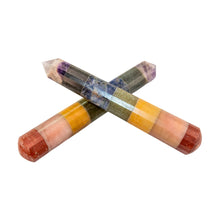 Load image into Gallery viewer, "Crossed crystal sticks with multicolored bands on a white background," - Down to Earth.
