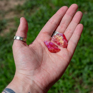 Cherry Aura Quartz Raw in Palm of a Hand - Down To Earth