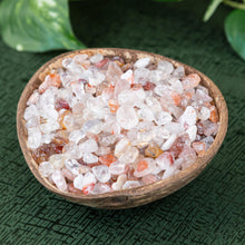 Load image into Gallery viewer, Fire Quartz Crystal Chips in a coconut shell side angle styled photo - Down to Earth

