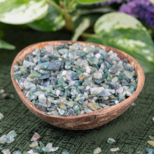 Load image into Gallery viewer, Green Moss Agate Crystal Chips in a coconut shell slight side angle styled photo - Down to Earth
