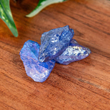 Load image into Gallery viewer, Cobalt Aura Quartz Raw on a wooden surface high angle - Down to Earth
