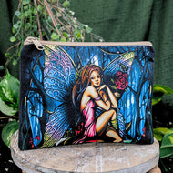 The Cosmic Fairy Bag on a wooden surface with greenery in the background - Down to Earth