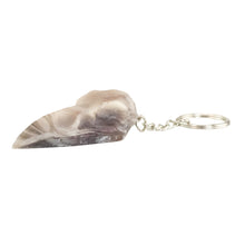 Load image into Gallery viewer, Resin Crow Skull Keychain gray &amp; white on a white background - Down To Earth
