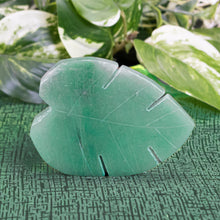 Load image into Gallery viewer, Crystal Leaf Aventurine displayed on a styled background - Down To Earth
