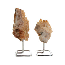 Load image into Gallery viewer, "Right side of two Druze Citrine raw crystals on silver stands on top of a white background," - Down to Earth.
