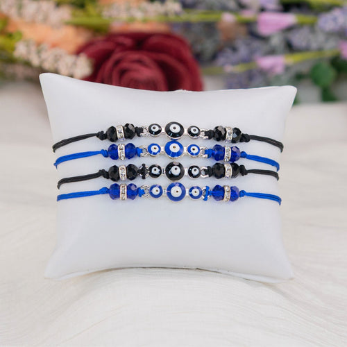 Evil Eye Knotted Bracelets Colors on a Small Pillow - Down To Earth