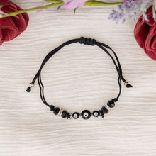 Load image into Gallery viewer, Black Evil Eye Bracelet Knotted Top Down Shot Styled - Down To Earth
