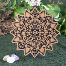 Load image into Gallery viewer, Evil Eye Crystal Grid with crystal front facing displayed on a styled background - Down To Earth

