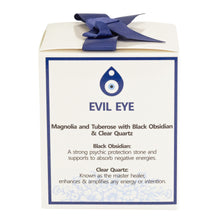 Load image into Gallery viewer, Evil Eye Protection Candle left side of packaging displayed on a white background - Down To Earth
